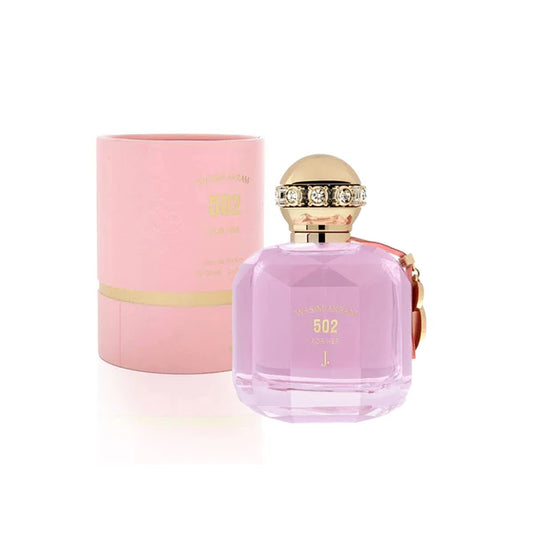 A bottle of WASIM AKRAM 502 FOR HER perfume next to its pink box, with a gold-colored cap and a clear label.